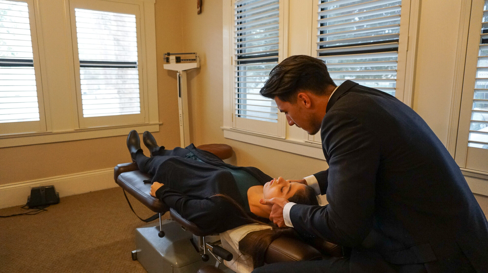 Ian Antovich performing an adjustment on a patient